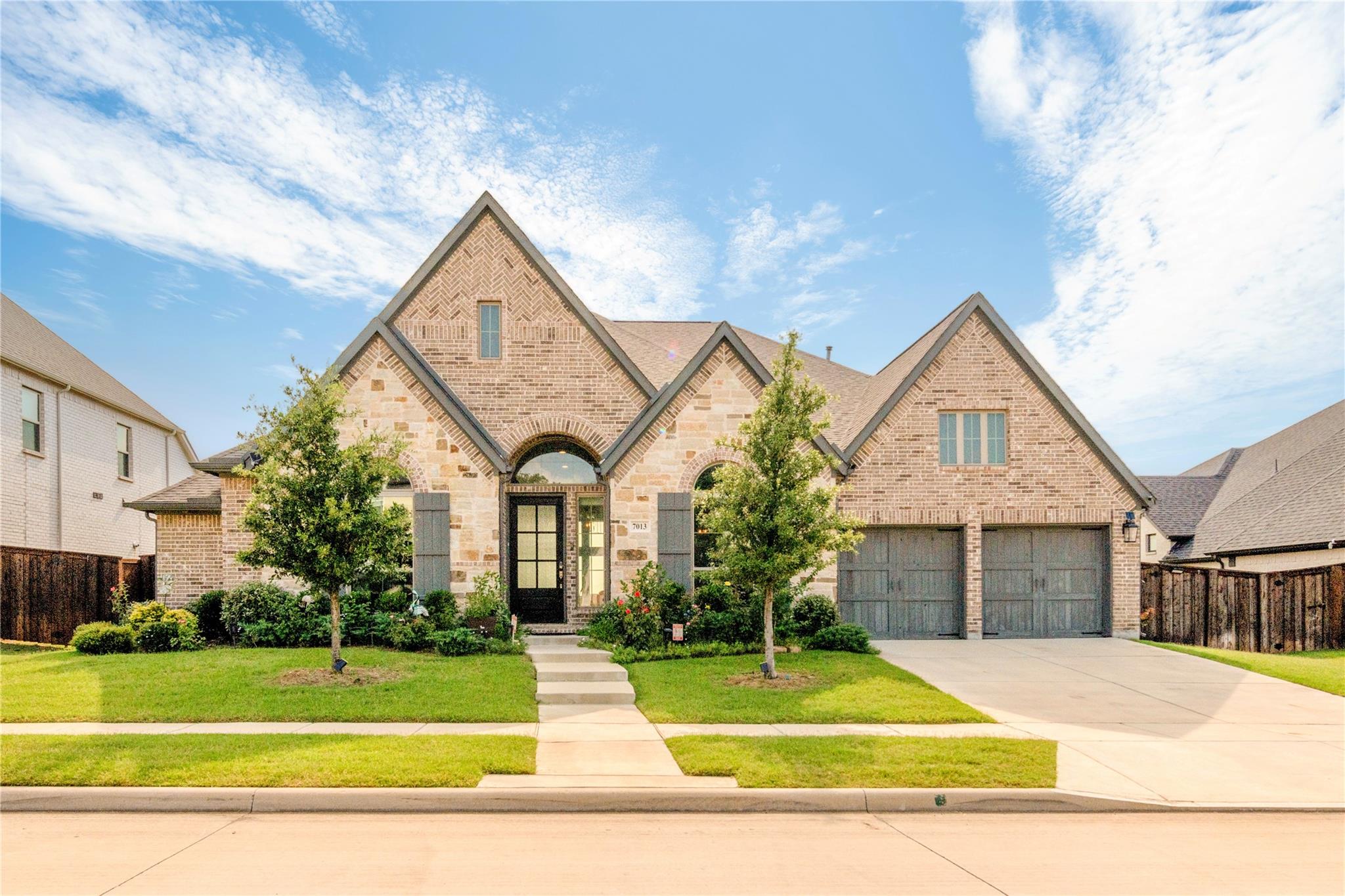 Elegant Perry Homes Residence with Soaring Ceilings, Private Office & Three-Car Garage